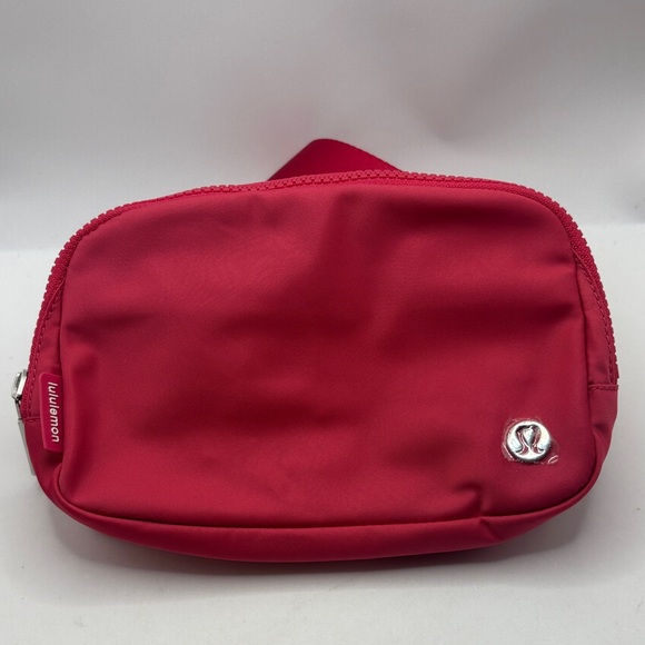 lululemon athletica Handbags - Lululemon Cherry Pink Everywhere Belt Bag Holds 1L Crossbody bright color NWT
